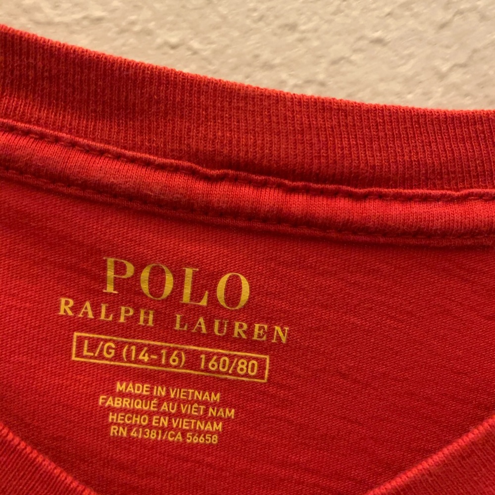 Red polo Fits like small